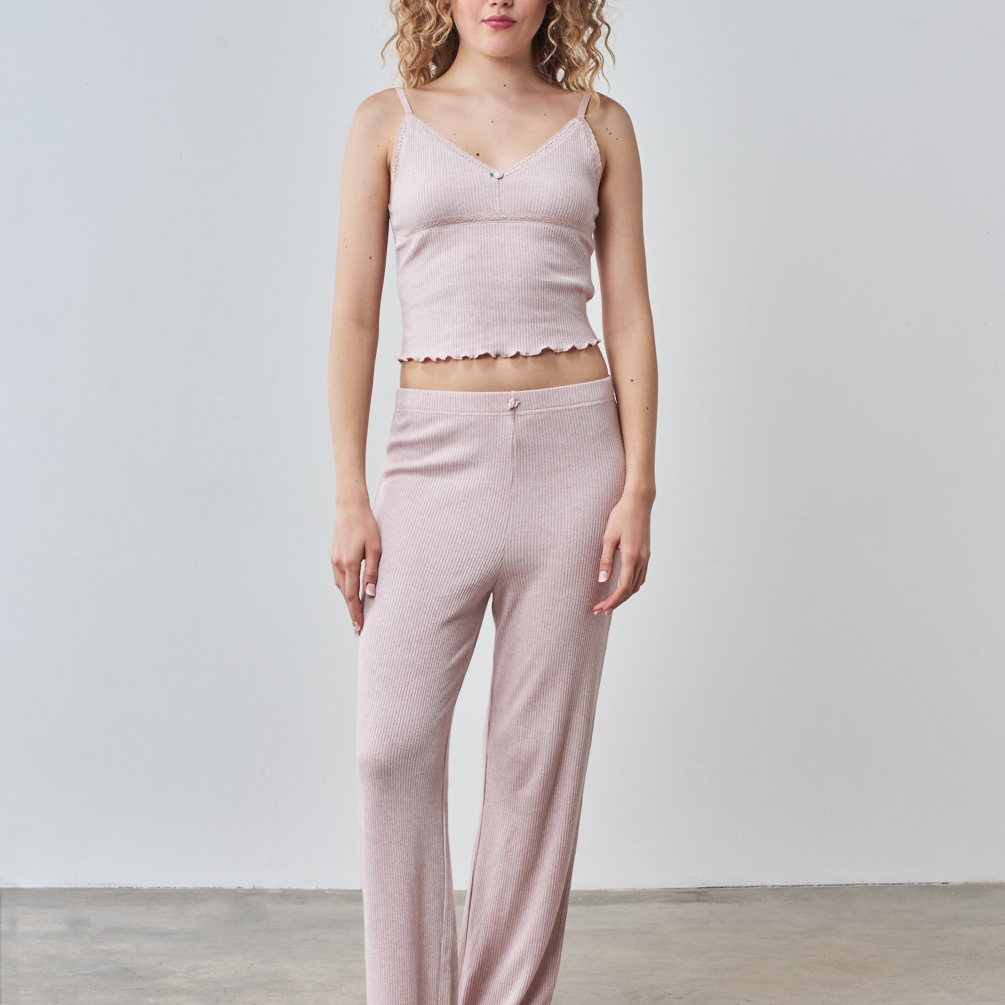 Pale pink cami top and trouser set with rose trims.