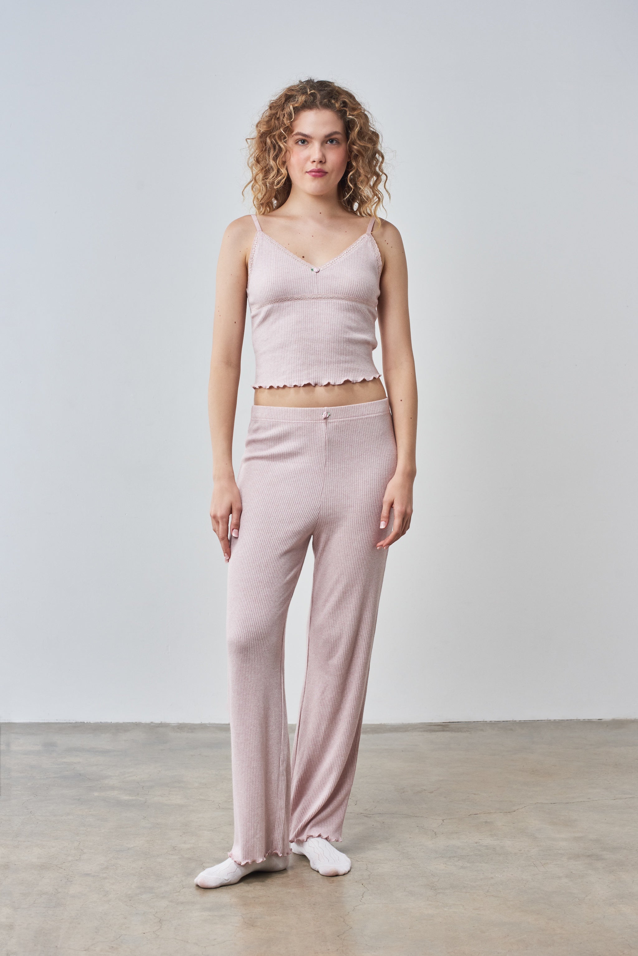 Pale pink cami top and trouser set with rose trims.